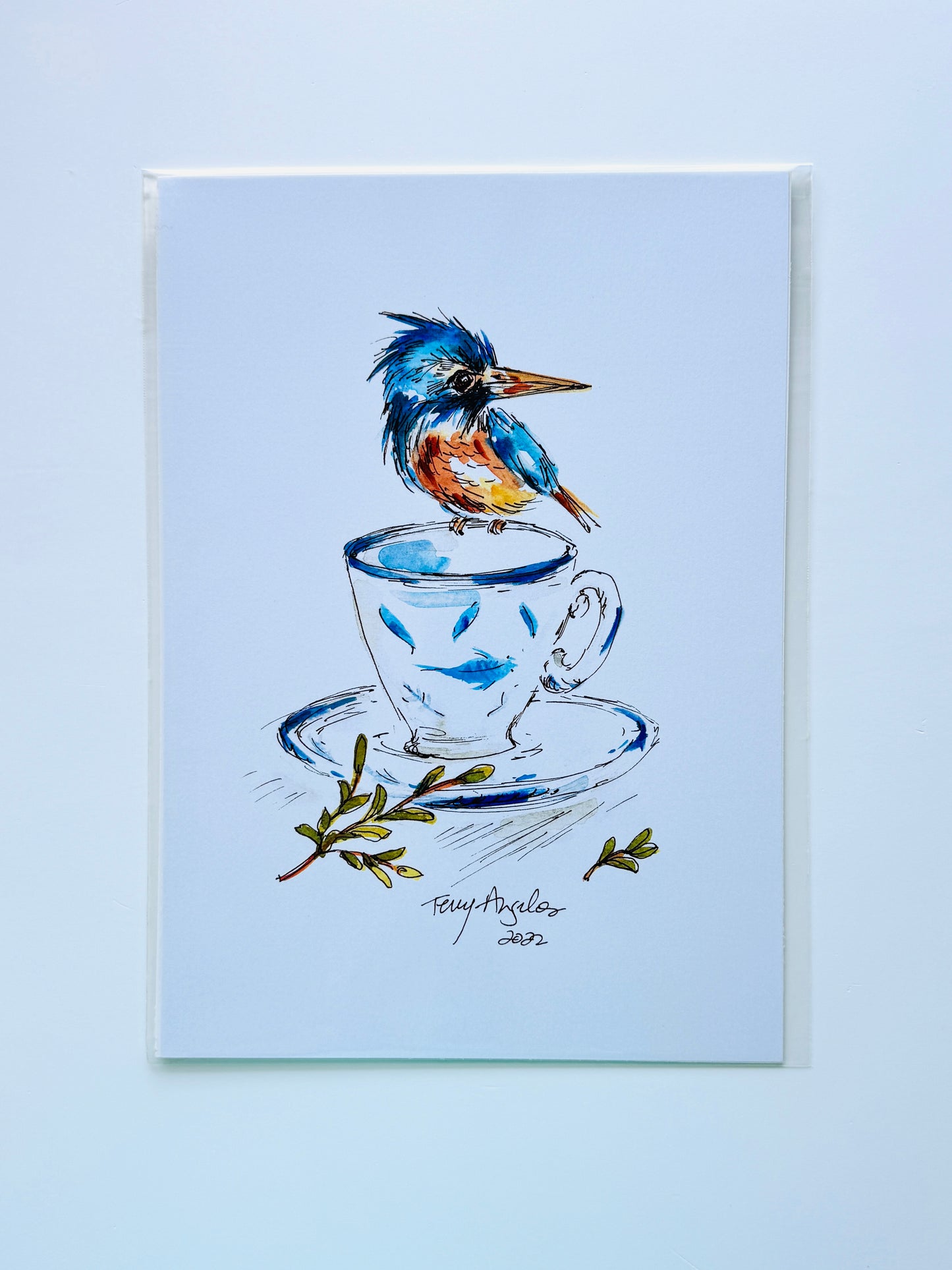 Tiny kingfisher in Cup